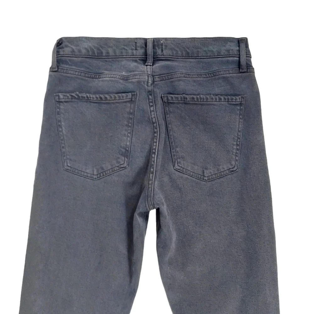 Agolde Black Mid Rise Toni in Montage Stretch Jeans
